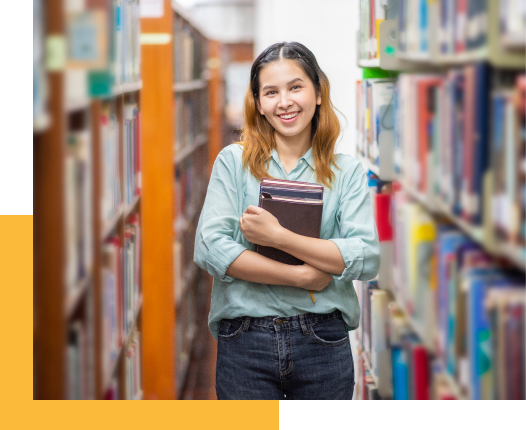 Young female college student in the library