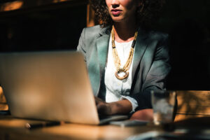 Woman working at her laptop.