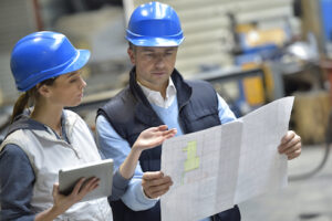 A man and woman in the construction business.